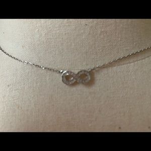 Swarovski Jewelry - Swarovski infinity silver necklace Swarovski Jewelry - Swarovski infinity silver necklace